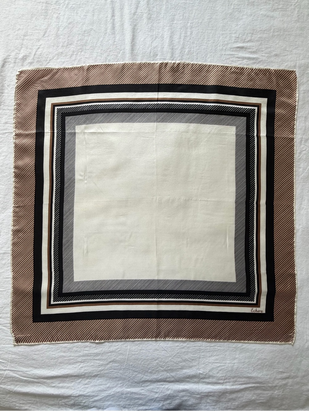 Echo Vintage Echo signed rolled-edge silk scarf featuring a brown, black, and wh - Picture 1 of 10